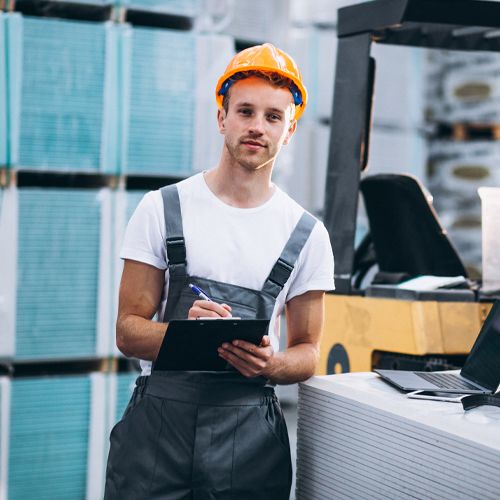 young-man-working-warehouse-with-boxes.jpg